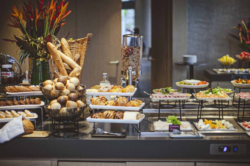 a buffet table with a jar of nutella on it