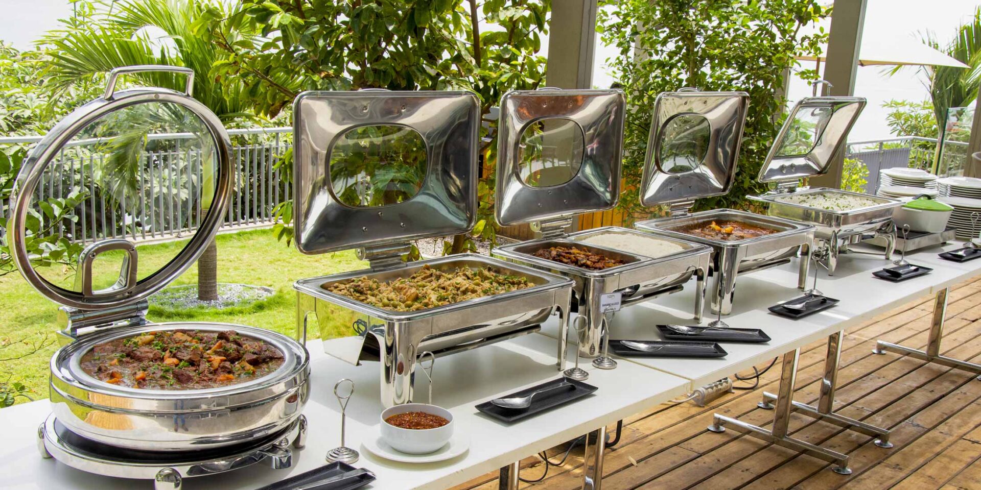 a buffet table with a variety of food on it